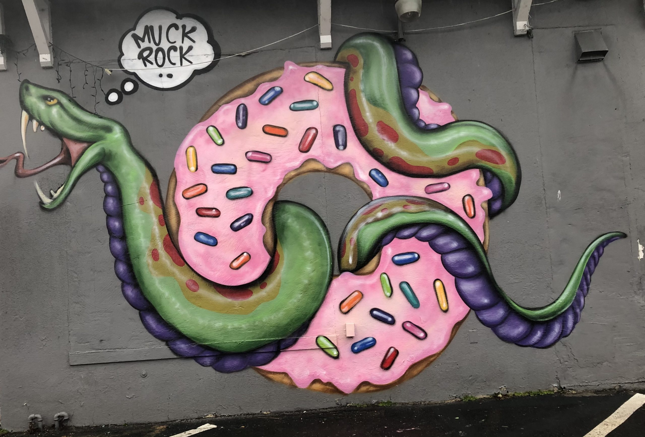 Freddy Donuts building features well-known muralist