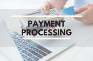 Black letters payment processing with laptop