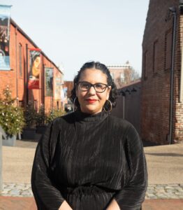 Dr. Gaila Sims standing outside.