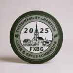2025 FXBG Sustainability Champion sticker.