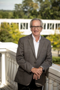 Curry Roberts photographed at  Buildings of Mary Washington University are in the background.